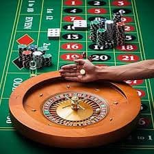 Close-up of live dealer hands dealing cards at Casino Hold'em table
